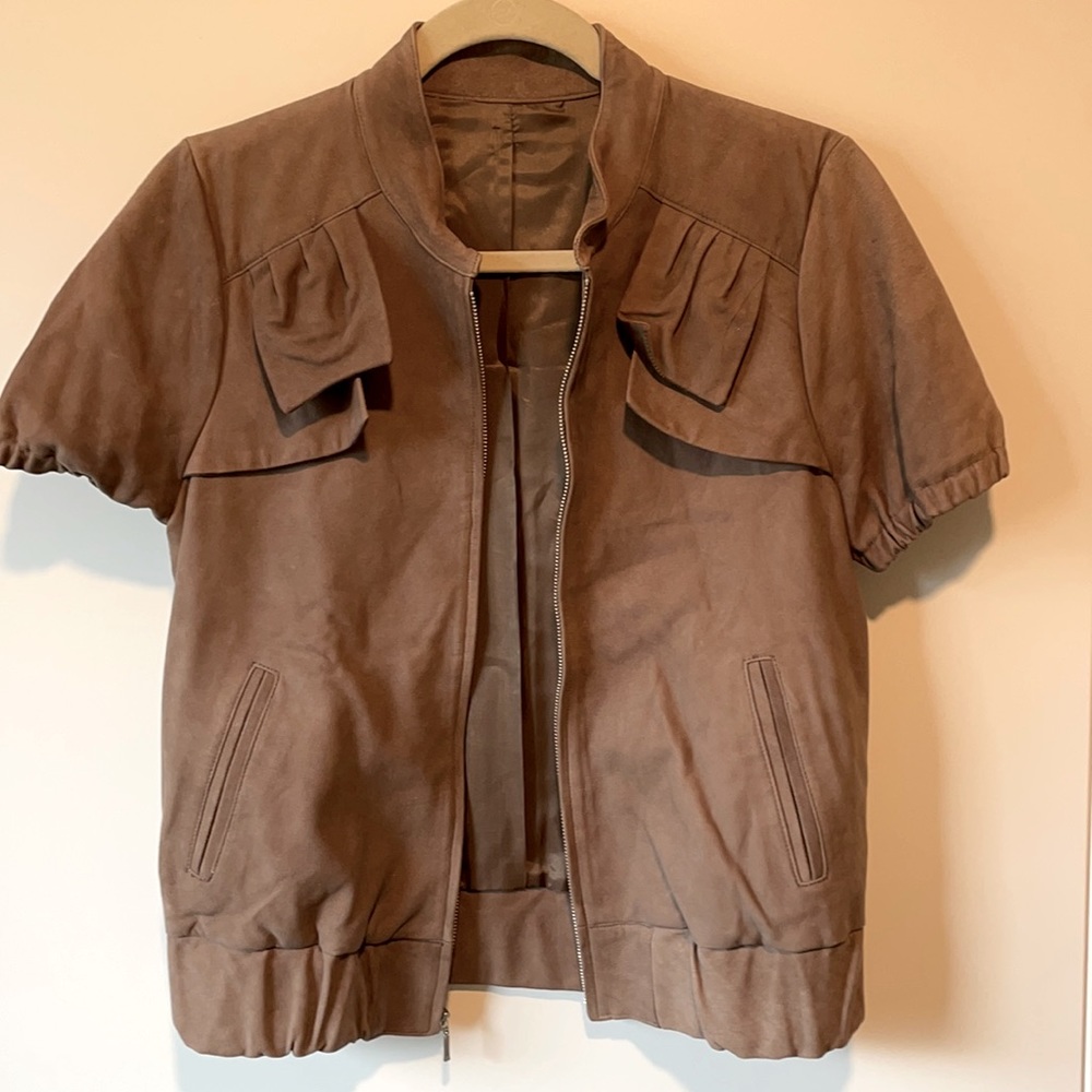 Brown leather short sleeve jacket. Vintage find. Size 6, wears 2-4.
